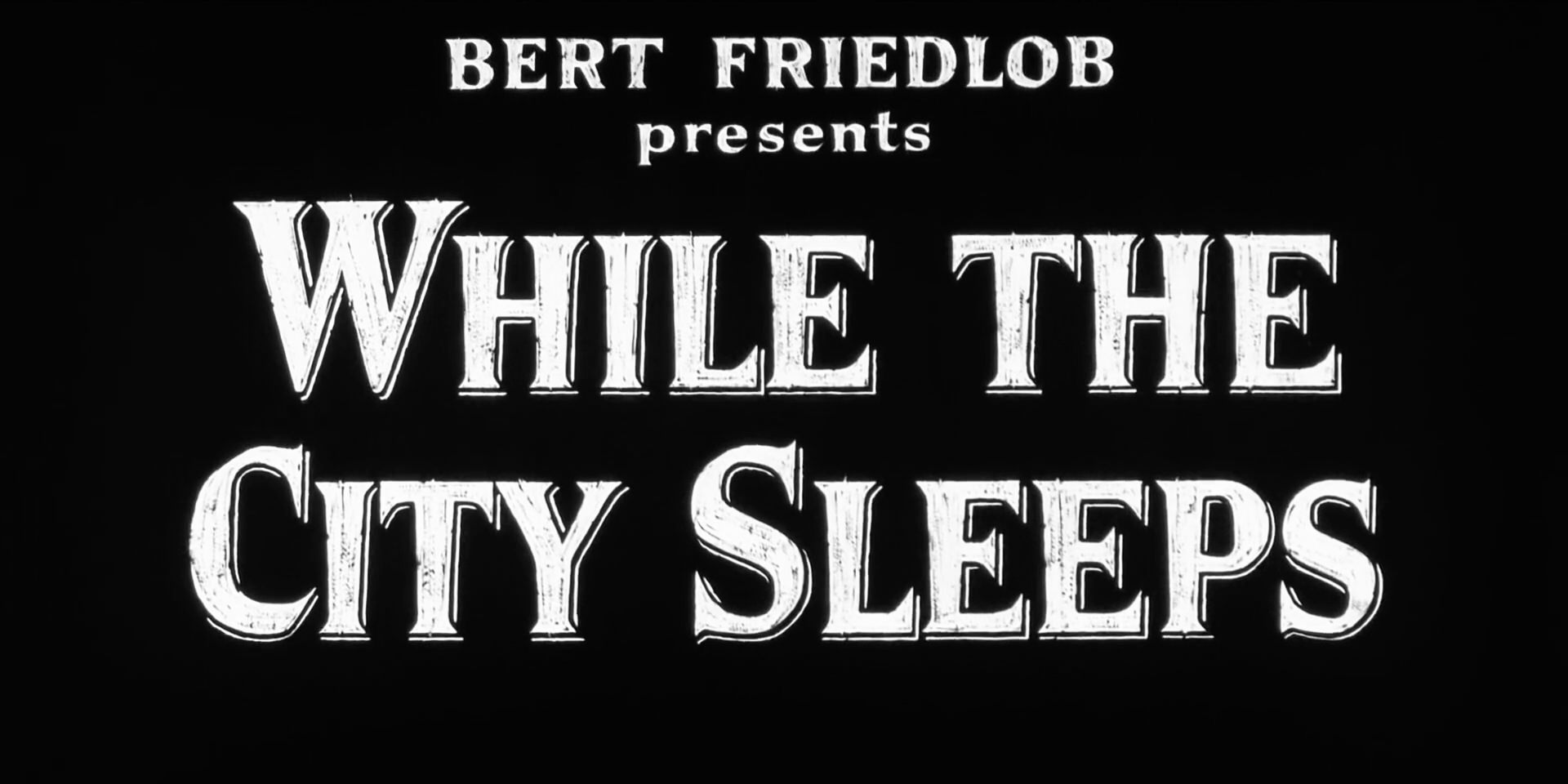 While The City Sleeps Title Card